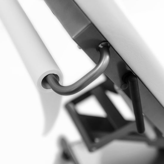 Pappershållare under huvudändan för Undersökningsbrits SL